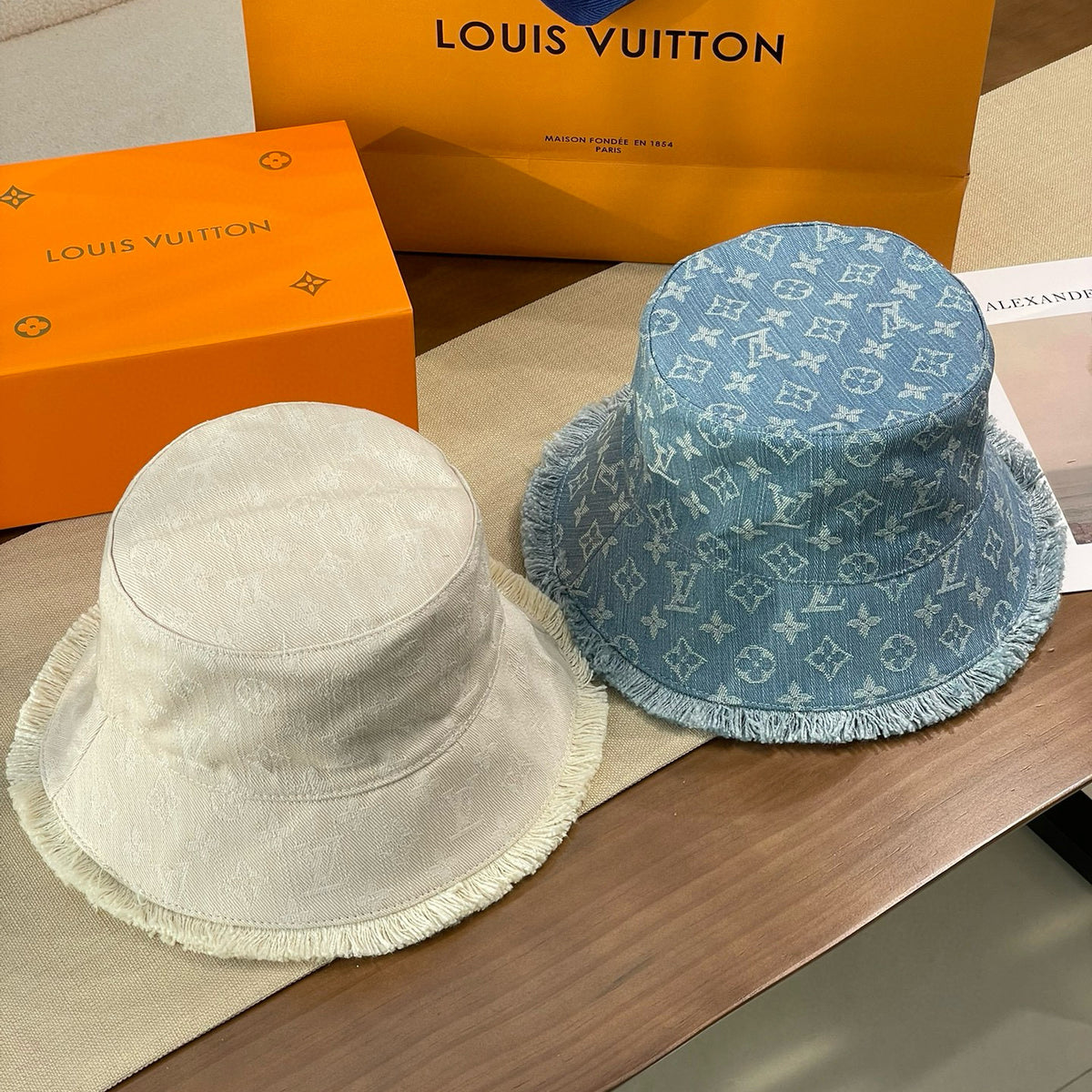 Louis Vuitton Men's and Women's Solid Color Letter Jacquard Raw Edge Cotton Fisherman's Hat Cap #76292