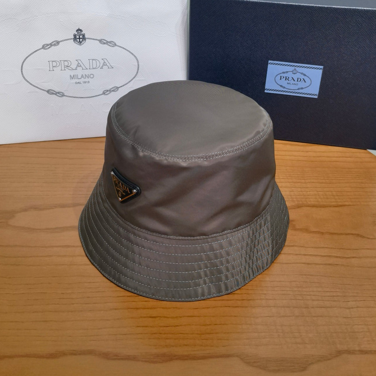 Prada Men's And Women's Fashion Casual Solid Color Triangle Logo Recycled Nylon Fisherman's Hat Style Hat Accessories #78682