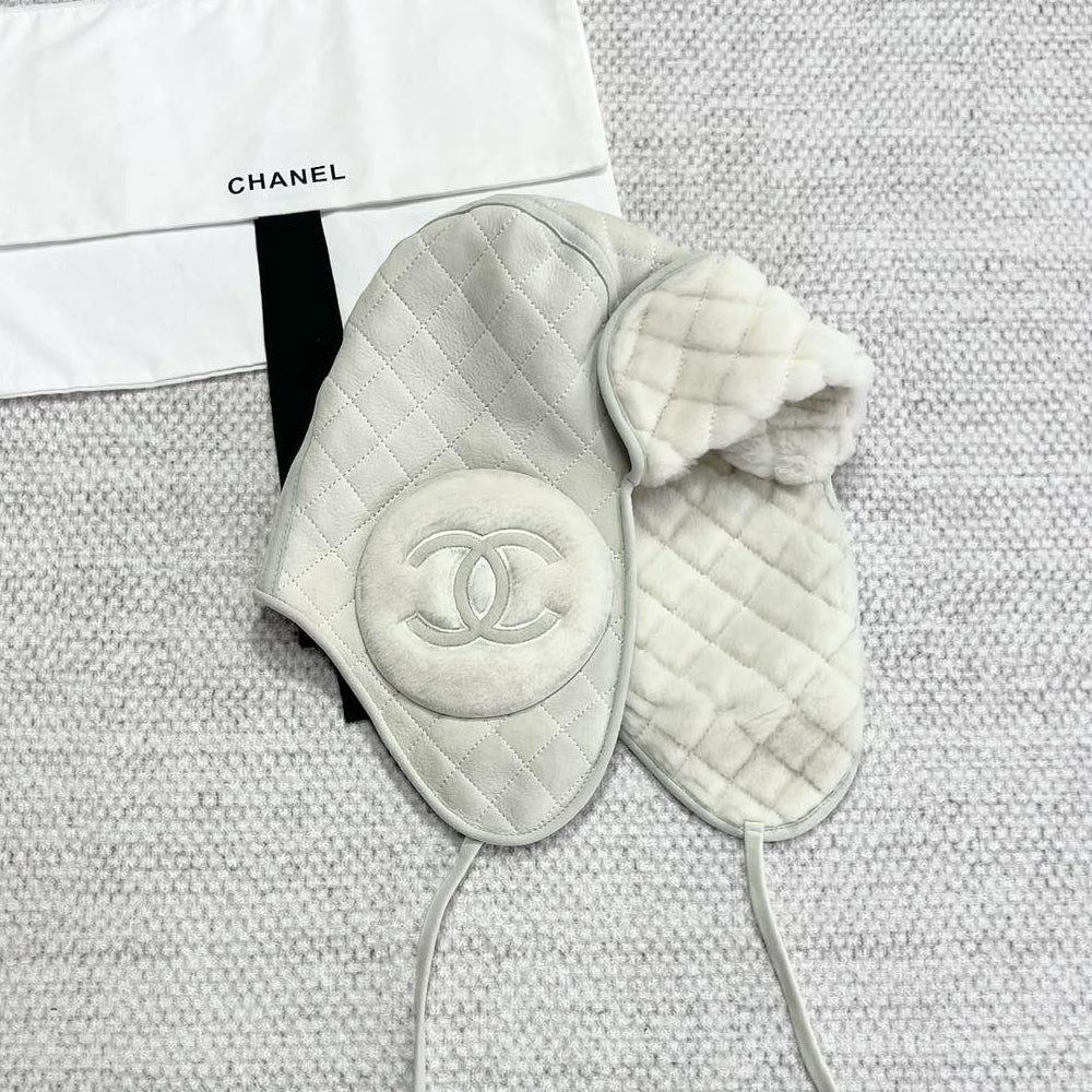 Chanel Men's and Women's Autumn and Winter Solid Color Sheep Leather Padded Cap Ears Hat #74597