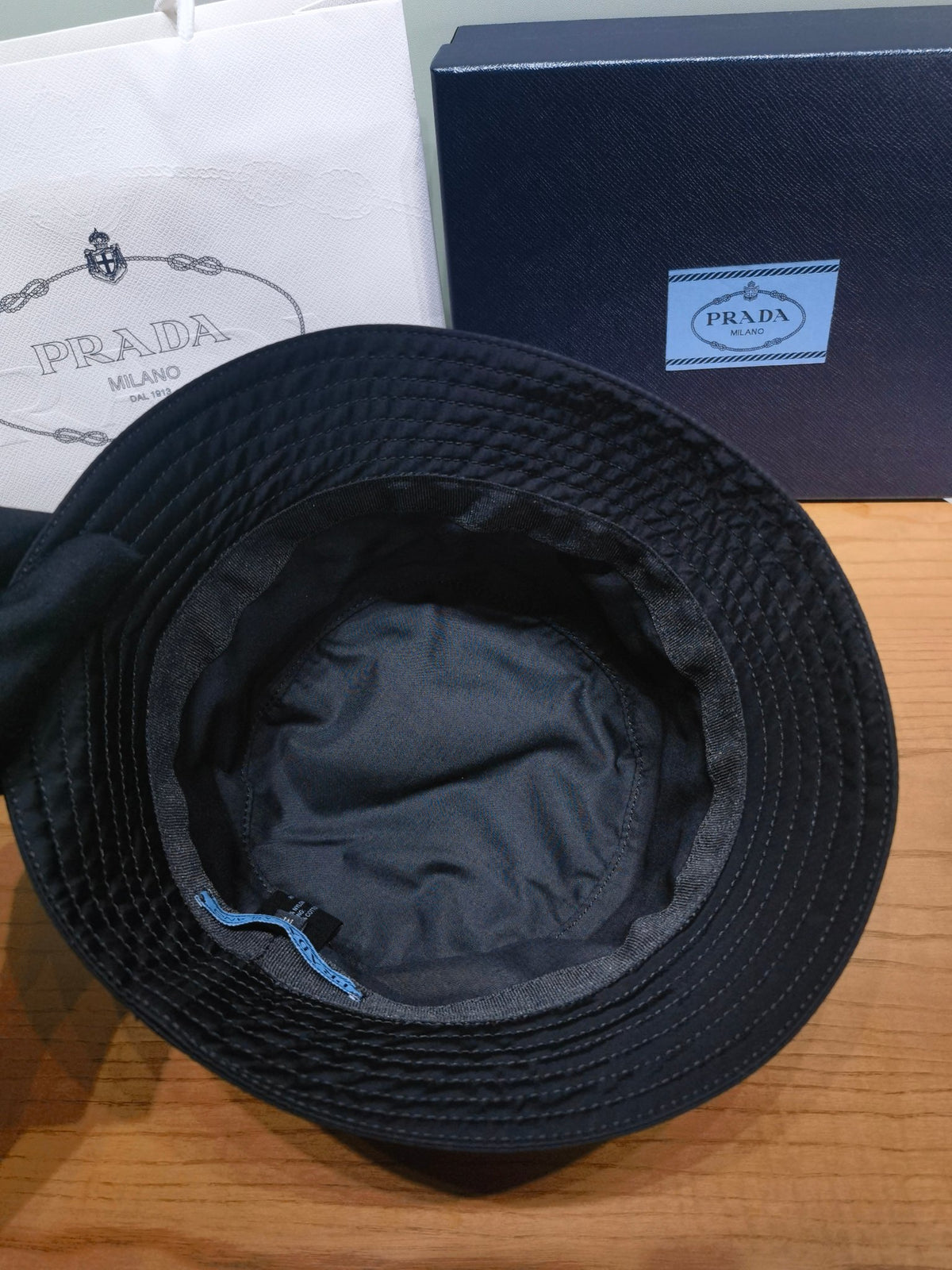 Prada Men's And Women's Fashion Casual Solid Color Triangle Logo Recycled Nylon Fisherman's Hat Style Hat Accessories #78682