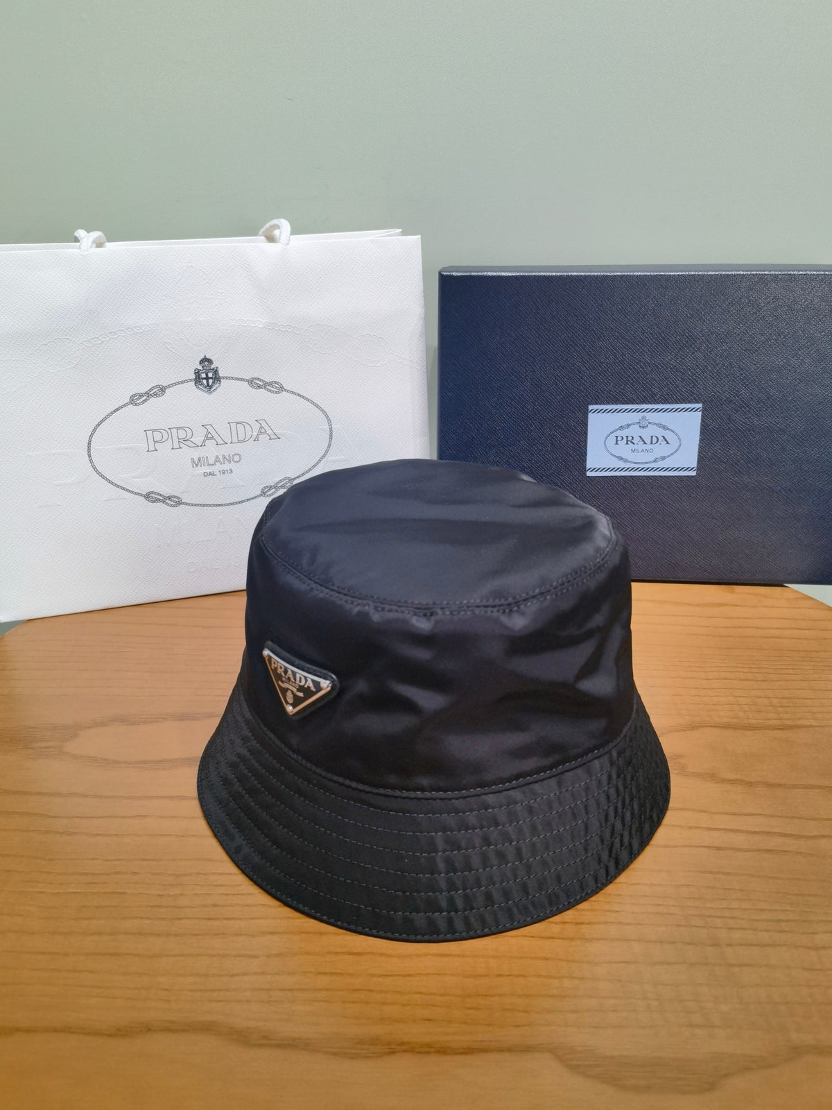 Prada Men's And Women's Fashion Casual Solid Color Triangle Logo Recycled Nylon Fisherman's Hat Style Hat Accessories #78682