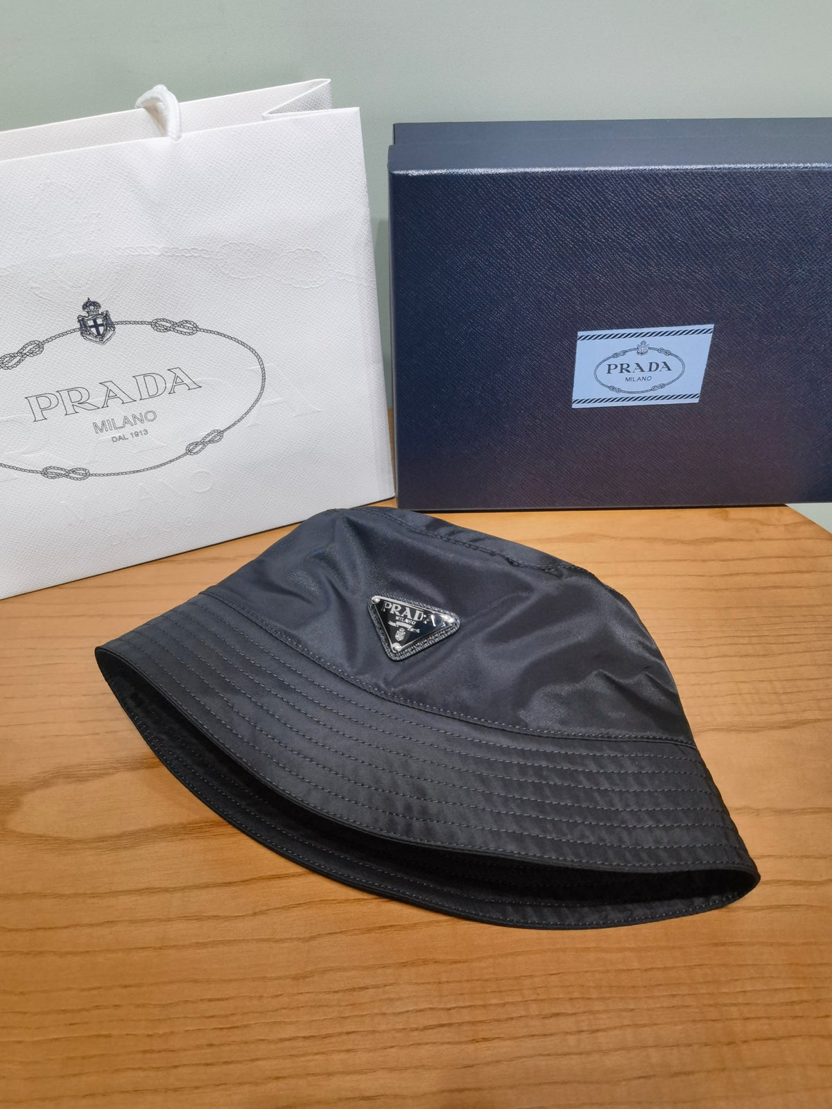 Prada Men's And Women's Fashion Casual Solid Color Triangle Logo Recycled Nylon Fisherman's Hat Style Hat Accessories #78682