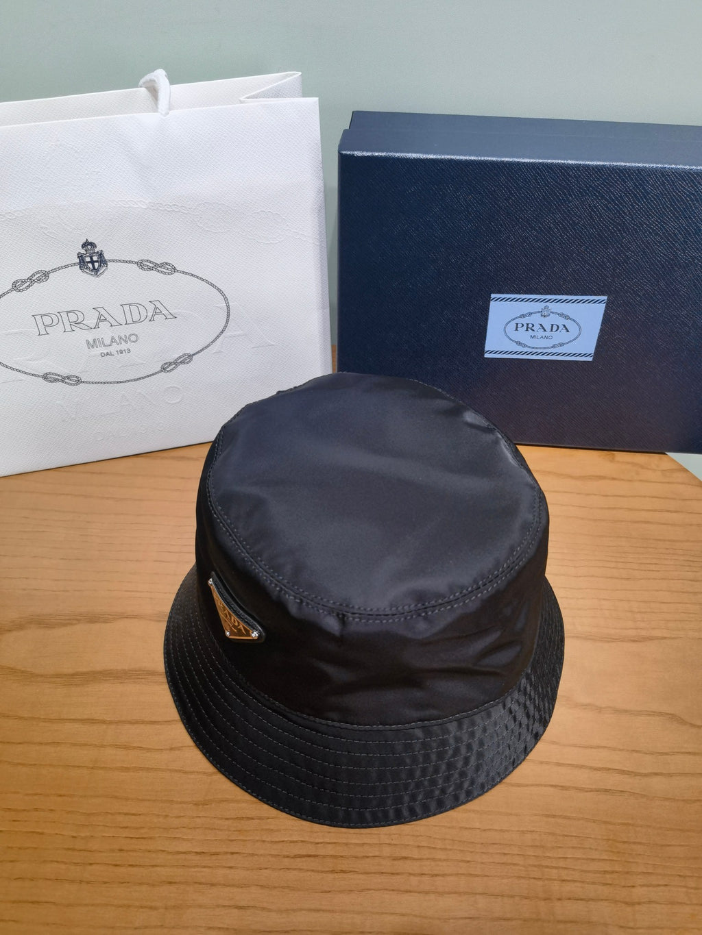 Prada Men's And Women's Fashion Casual Solid Color Triangle Logo Recycled Nylon Fisherman's Hat Style Hat Accessories #78682