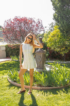 LINARA Low Drop Waist Boat Neck Mini Dress